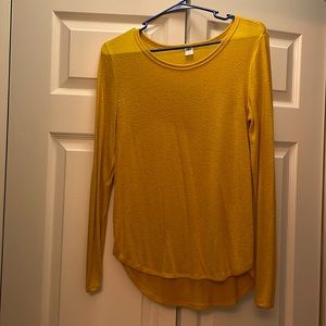 76% rayon/viscose, 20% polyester, 4% spandex - stretchy, comfy t-shirt